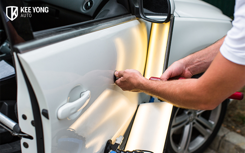 Dents On A Car Getting Repaired