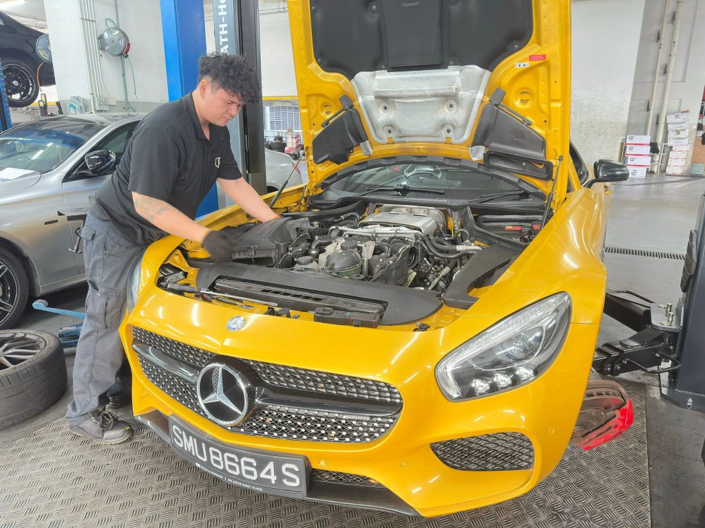 yellow mercedes servicing